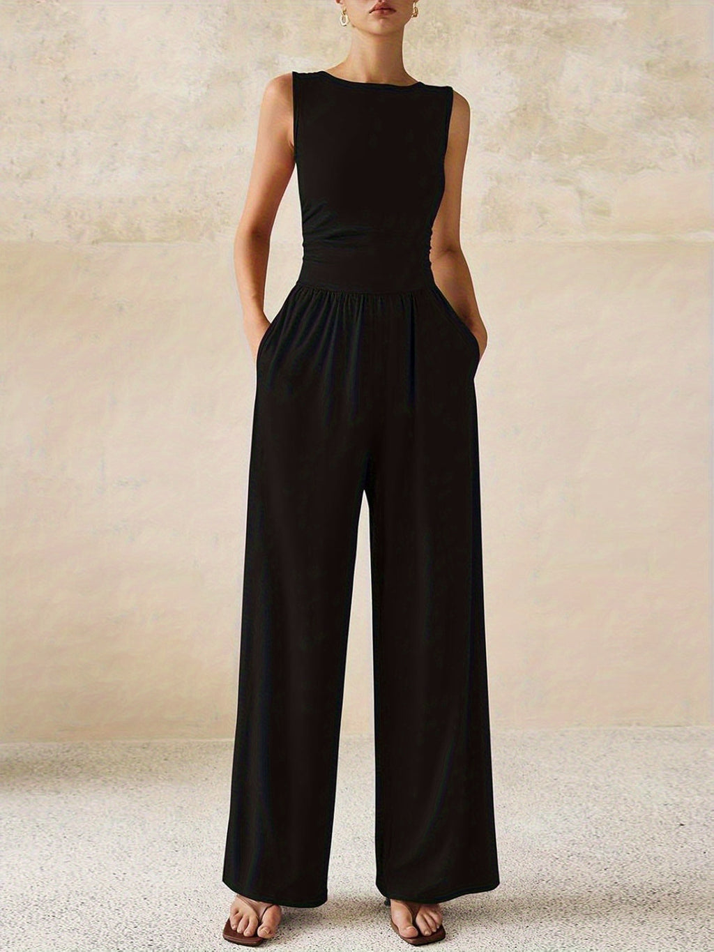 Combinaison noir pantalon large chic sans manche