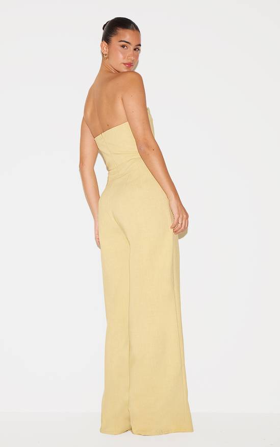combinaison jaune femme avec dos nu et taille froncée