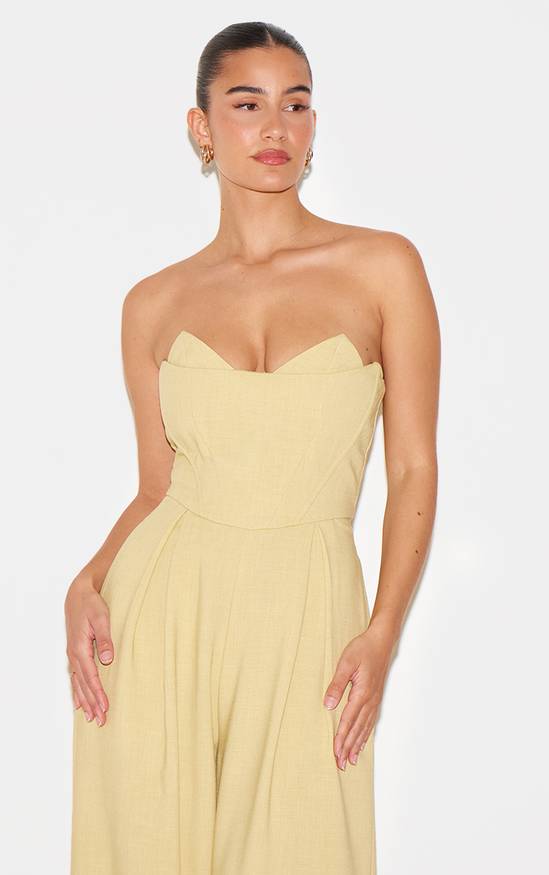 combinaison jaune femme avec dos nu et taille froncée